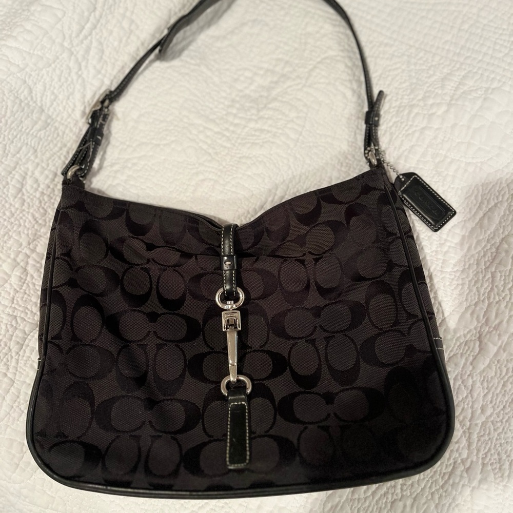 Coach black shoulder bag with silver hardware. Very good condition. Price firm.